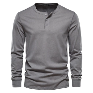 Men's slim fit grey long sleeve Henley shirt with buttoned crew neck on white background