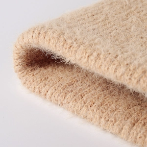 Minimalist knit beanie for women in khaki feather yarn with thick warm texture