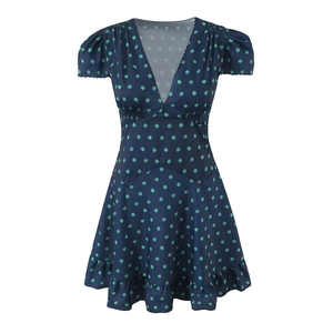 Navy blue V-neck short sleeve dress with green floral patterns and ruffled hem detail