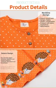 Detail of girls' orange polka dot dress featuring hedgehog embroidery and wooden buttons