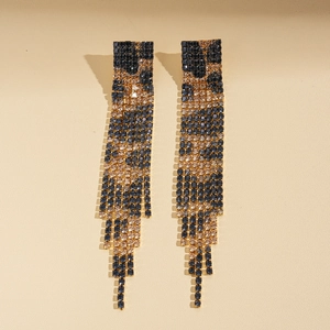Elegant gold leopard print fringe earrings with sparkling black and amber rhinestones