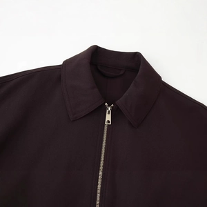 Fashionable dark jacket with classic lapel collar and premium silver metal zipper