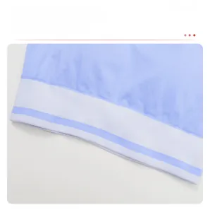 Detail of wide striped elastic hem on light blue sports bra for non-slip fitness support