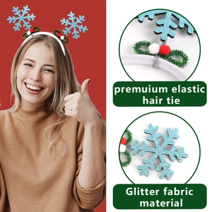 Christmas headband with blue glitter snowflakes and red berries on a red background