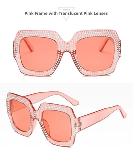 Detail view of pink square oversized sunglasses with sparkling rhinestone crystals