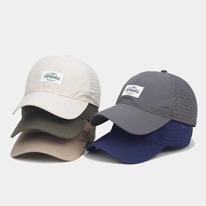 Multi-color quick-dry baseball caps with laser-cut ventilation and Paradise logo patch