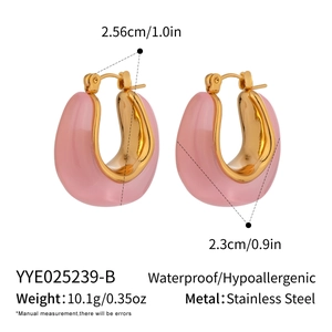 Detail view of pink enamel U-shaped earrings with size and weight dimensions