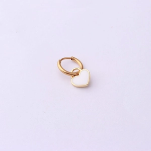 Detailed view of white heart-shaped enamel charm on a gold-plated stainless steel hoop earring