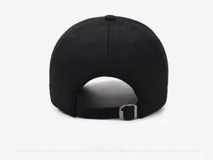 Detail view of the black baseball cap back with adjustable metal buckle and fabric strap