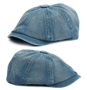 Close-up of blue denim baker boy caps with stitched panels and a classic top button