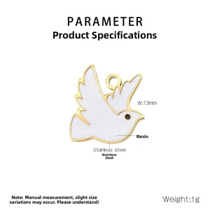 Detail view of 13mm white resin dove pendant charm with gold stainless steel edges