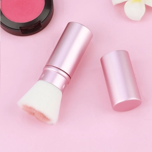 Detail of pink cat claw retractable makeup brush with soft gradient fiber bristles