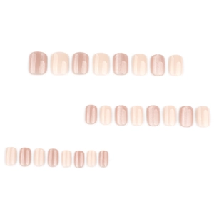 Faux ongles carrés courts en tons nude et rose scintillant avec une finition nacrée