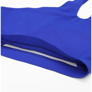 Detail of royal blue sports bra with reinforced double-needle stitching and high elasticity fabric