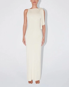 Close-up of cream sleeveless dress featuring a slim-fit cut and stylish shoulder ribbon detail