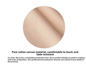Close-up of high-quality pure cotton canvas fabric showing fine woven texture in beige