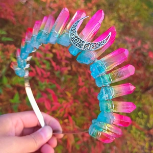 Detailed shot of pink and blue gradient crystal wicca crown with silver crescent moon