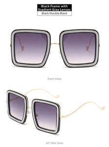 Detail view of square black frames with silver glitter and gradient purple lenses