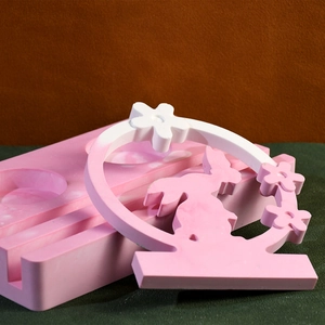Detailed silicone mold for DIY aroma candle holder with rabbit and floral design