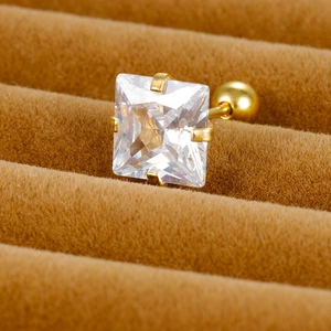 Macro detail of 3mm-8mm square zircon stud earring with gold finish and ball screw back