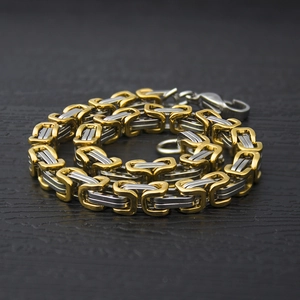 Two-tone gold and silver stainless steel Byzantine chain bracelet with lobster clasp