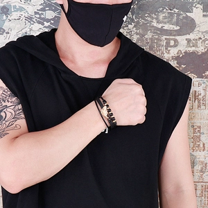 Men's multi-layer braided leather bracelet with golden feather pendant and black beads