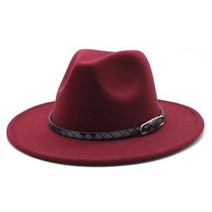 Detail of wool fedora hat with burgundy felt texture and black braided decorative band