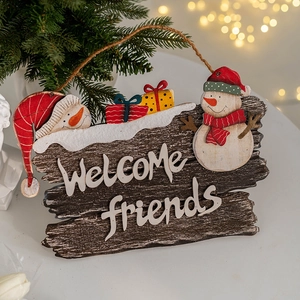 Vintage Christmas wooden welcome sign with snowman and gifts for holiday door decor