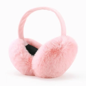 Close-up of soft pink plush earmuffs with a smooth fuzzy texture for winter warmth