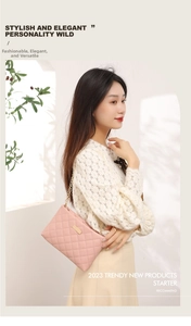 Detail of pink quilted crossbody mini bag with gold metal chain and rectangular plaque