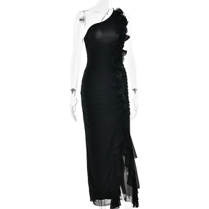 Detail view of black one-shoulder mesh dress with vertical ruffle decorative trim