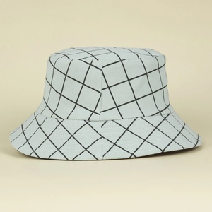 Close-up of mint green plaid bucket hat featuring breathable canvas texture and patterns