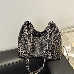 Vintage leopard print oversized tote bag with knotted shoulder straps and litchi texture