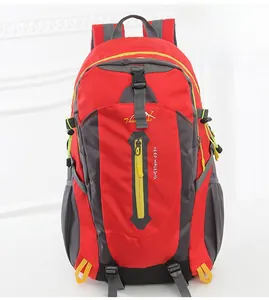 Detail of red and grey hiking backpack featuring vertical zipper and Keep Walking logo