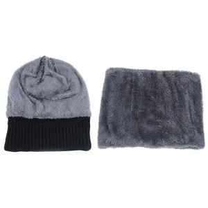 Winter beanie and neck warmer set with thick fleece lining in black and grey knit