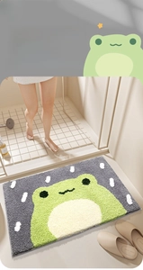 Detail of grey cartoon frog bath mat with high-absorbent thick flocking and anti-slip backing