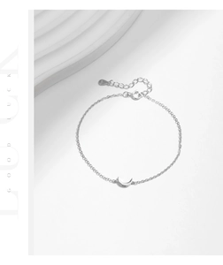 Detail showing the S925 sterling silver hallmark on the crescent moon bracelet clasp
