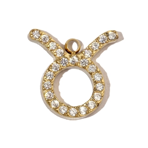 Detailed view of Taurus zodiac pendant with sparkling zircon inlays in gold plating