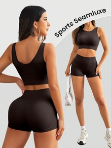 Seamless ribbed two-piece yoga set with crop top and high-waisted shorts in dark brown