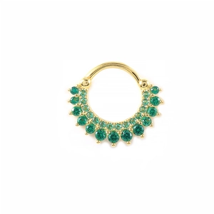 Detailed view of a golden cartilage hoop with double rows of green zircon stones