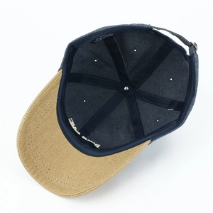 High-quality washed cotton baseball cap in navy blue and tan with adjustable strap
