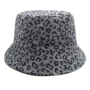 Detailed close-up of leopard print corduroy bucket hat texture and patterns