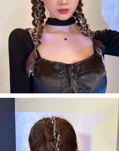 Detailed view of silver star hair chain woven into braided pigtails with creative lighting