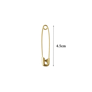 Detail of 4.5cm golden metal safety pin for securing the birthday girl sash