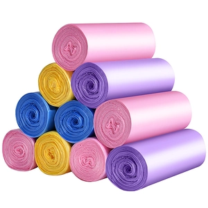 Thickened flat-top colorful plastic garbage bags stacked in multiple rolls on white background