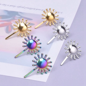 Macro shot of sunburst geometric 304 stainless steel studs in gold silver and rainbow