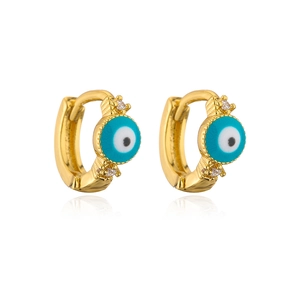 Detailed macro view of 18K gold evil eye hoop earrings featuring blue zircon inlays