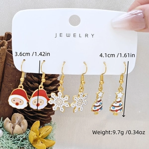 Detail view of Santa Claus and snowflake Christmas earrings with dimensions and weight info