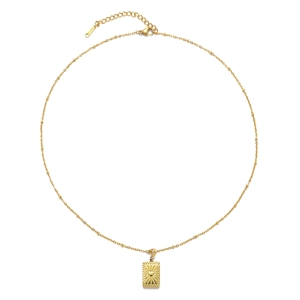 Close-up of golden stainless steel necklace with heart and sunray engraved pendant