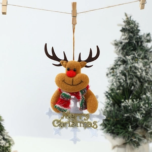 Close-up of reindeer and snowflake Christmas hanging ornament with Merry Christmas text